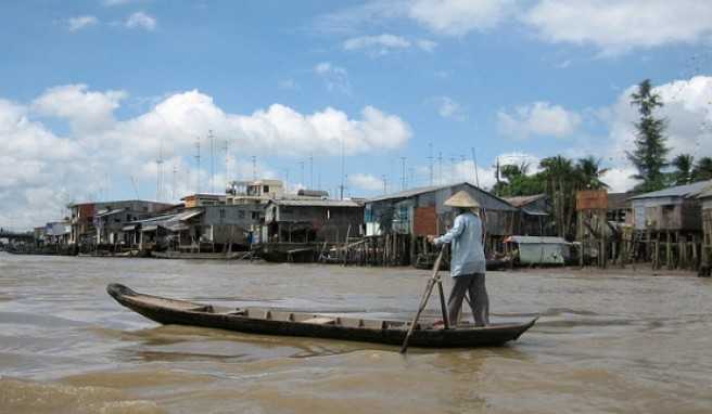Eine typische Siedlung am Mekong River.##Foto: flickr.com douglaspperking Eine typische Siedlung am Mekong River.